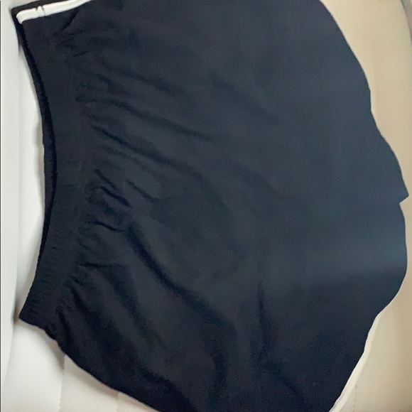 Black trim shorts, white trimming and white ties - Picture 3 of 4